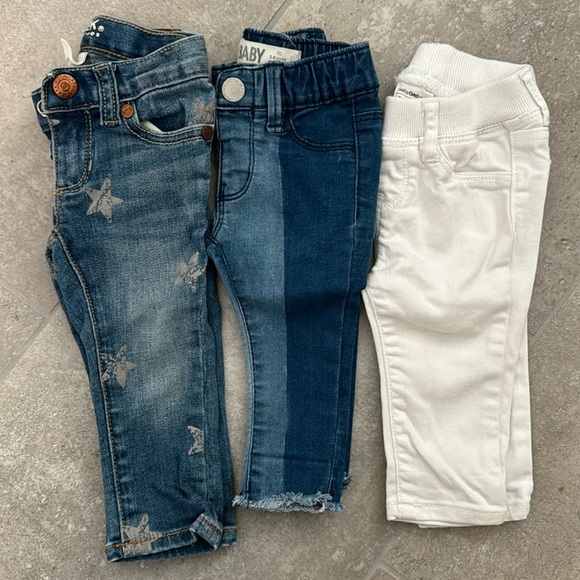 Three pairs of baby jeans. - Picture 1 of 3